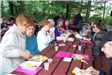 Seniors Eating at an Outdoor Picnic 1