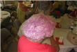 Woman Wearing Pink Hat, Back View