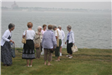 Group of Women Standing by the Water
