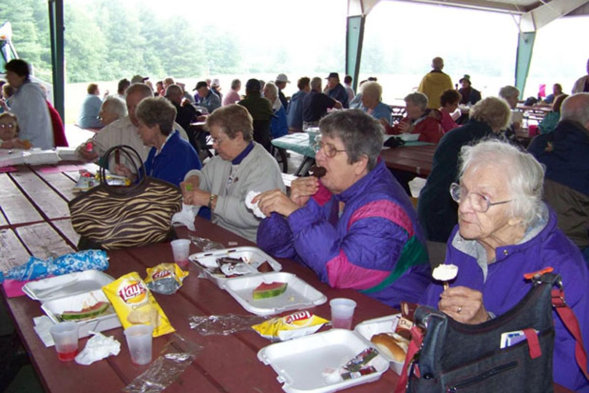 Seniors Eating at an Outdoor Picnic 7