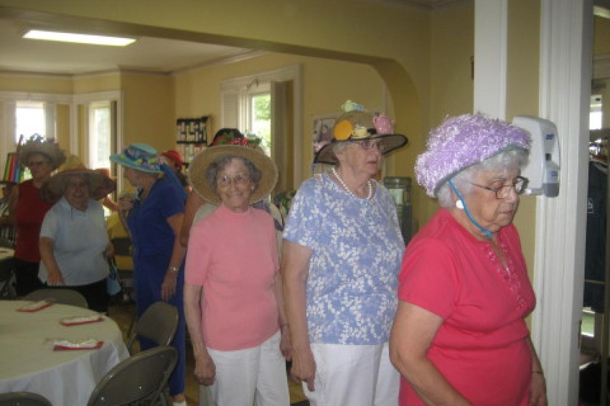 Line of Women Wearing Hats