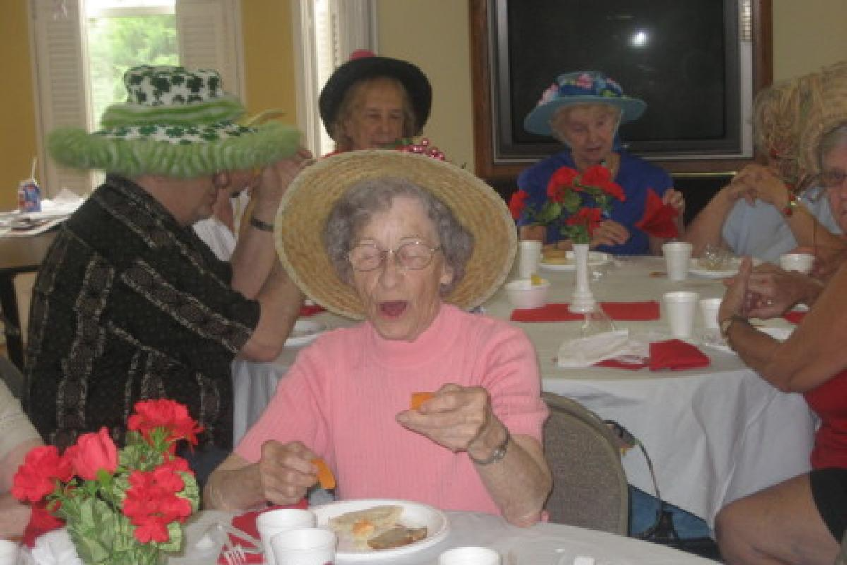 Seniors Eating at Tables