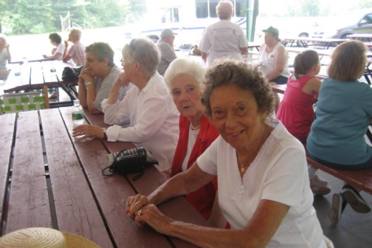 Four Senior Women Sitting
