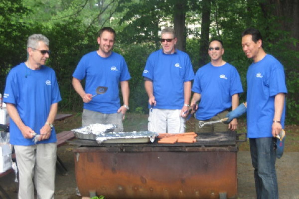 Group of Men Cooking