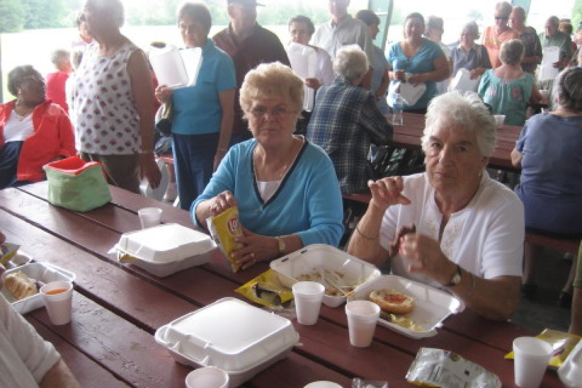 Two Senior Women Eating