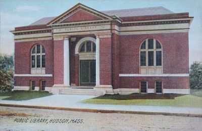 A drawing of a red brick building with white pillars