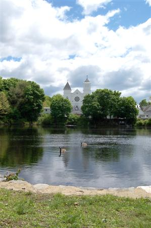 View from back of center, looking over Bruce's Pond at St. Michael's Church